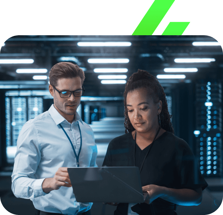 it-employees-using-laptop-in-data-center